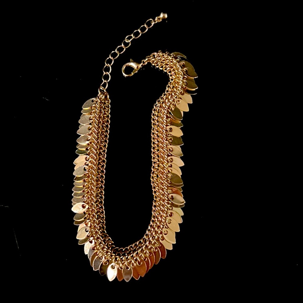 Gold tone fluid type bracelet